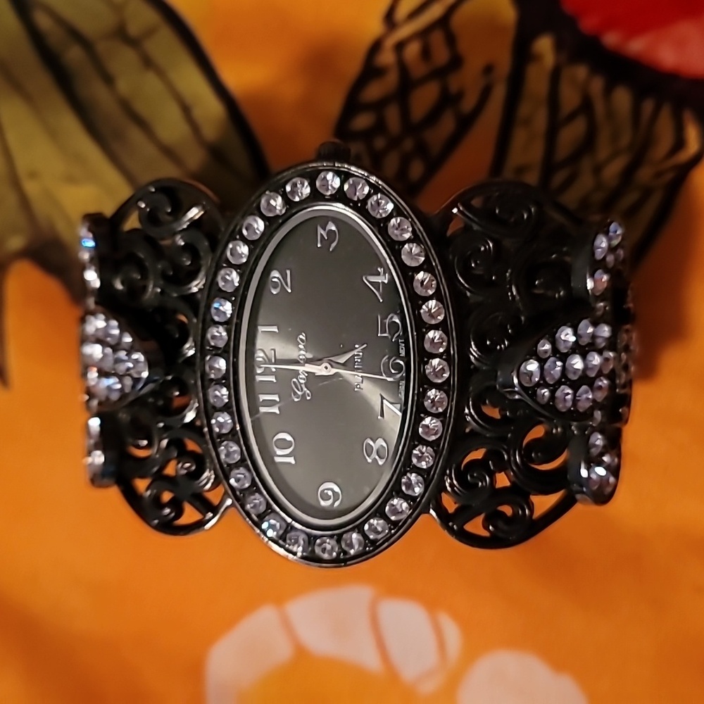 Geneva Platinum Black Oval‎ Cuff Fleur De Lis Watch Covered In Clear Crystals